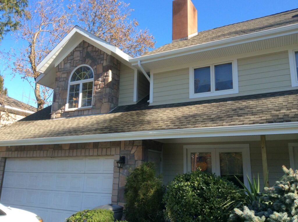after construction photo showing front of home with garage
