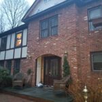before photo of the front of home from a side angle