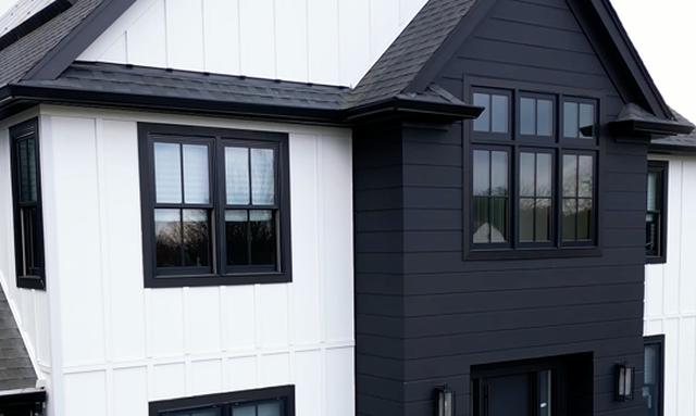 Midnight black James Hardie siding with black window frames