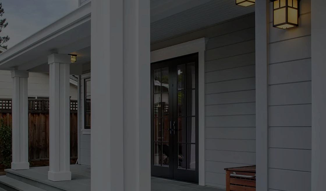 Covered porch showing James Hardie siding, trim and soffit sealing the building envelope