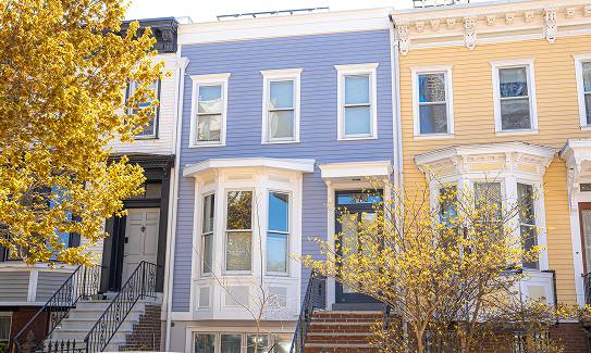 Brooklyn row houses clad in painted lap siding