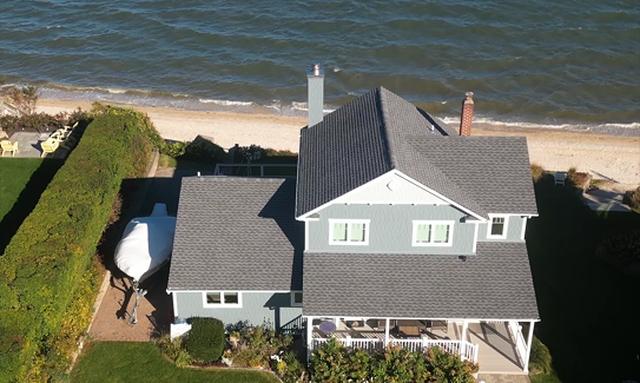 Shingle-style coastal home on the Long Island shoreline